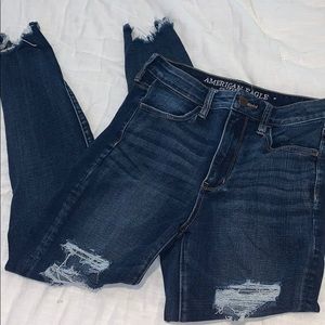 Super hi-rise, dark wash, distressed, jeans.